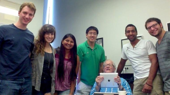 group photo of Aryeh with students